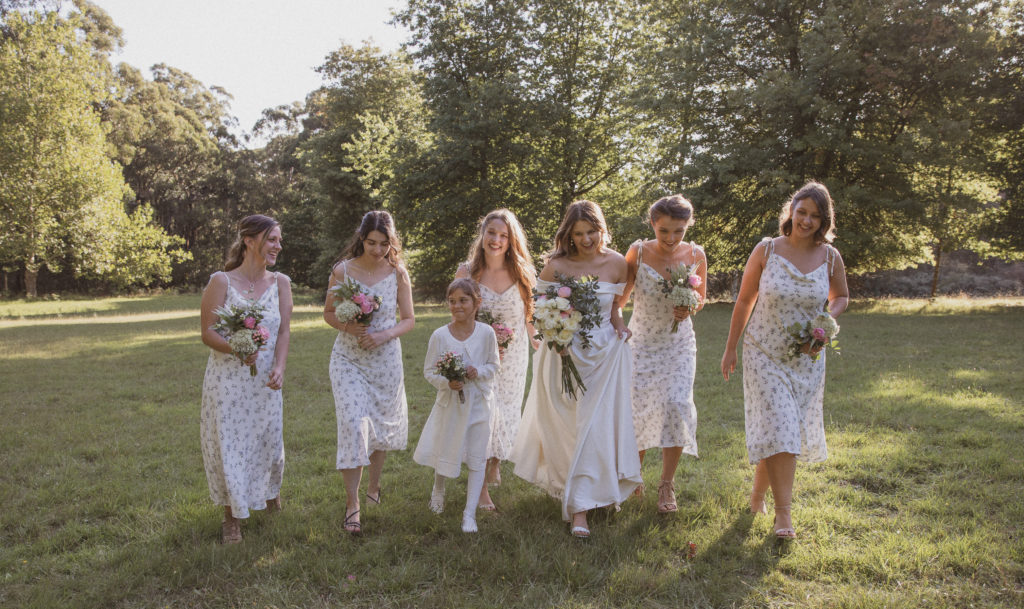 bridesmaids frollicking in beautiful melbourne forest
